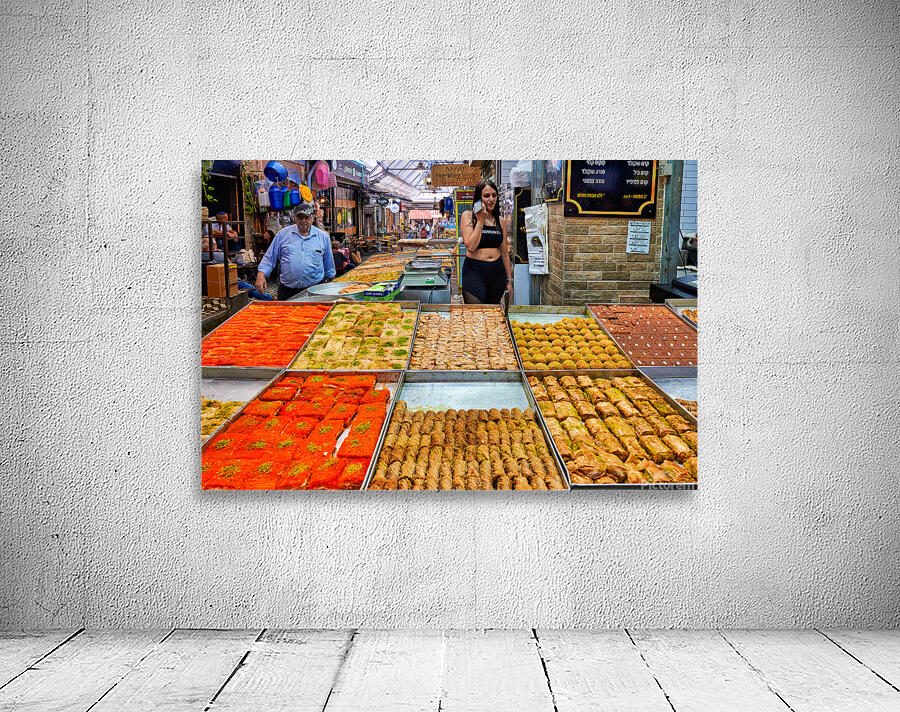 Visitors explore food stands at Mahane Yehuda Market in Jerusale Wall Preview