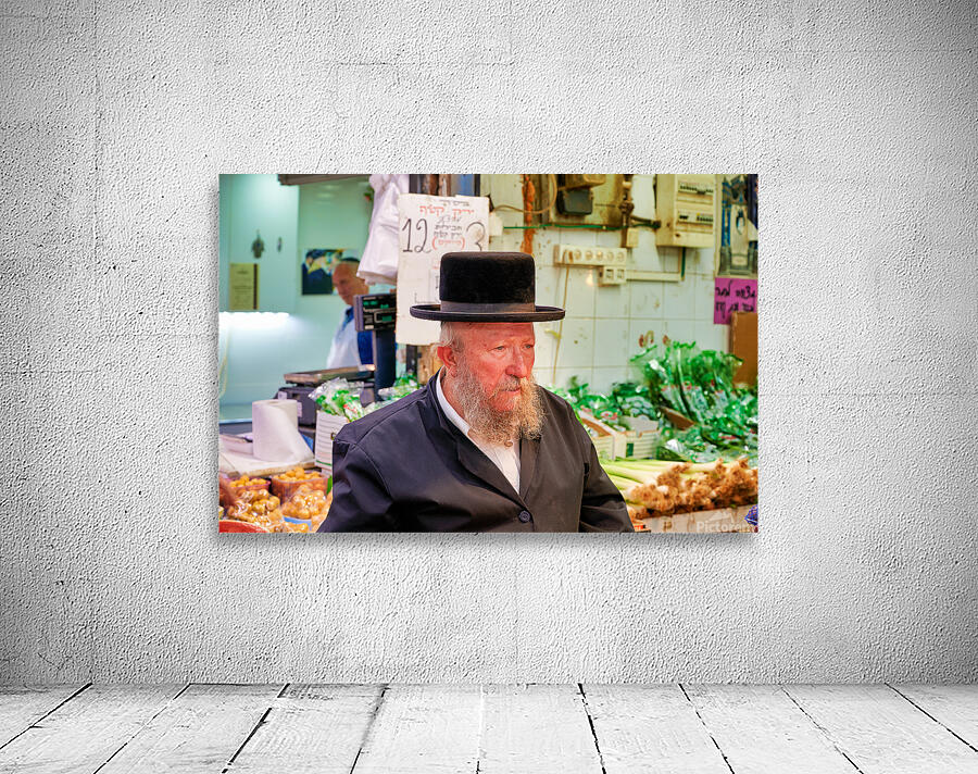Elderly man in Mahane Yehuda Market in Jerusalem during a busy d Wall Preview