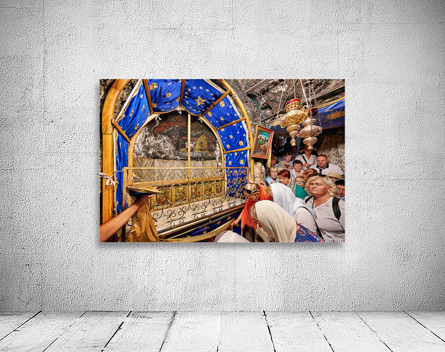 Visiting grotto of nativity in Bethlehem Jerusalem during the d Wall Preview