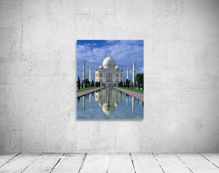 Taj Mahal stands in Agra with clear sky and reflecting pool Wall Preview
