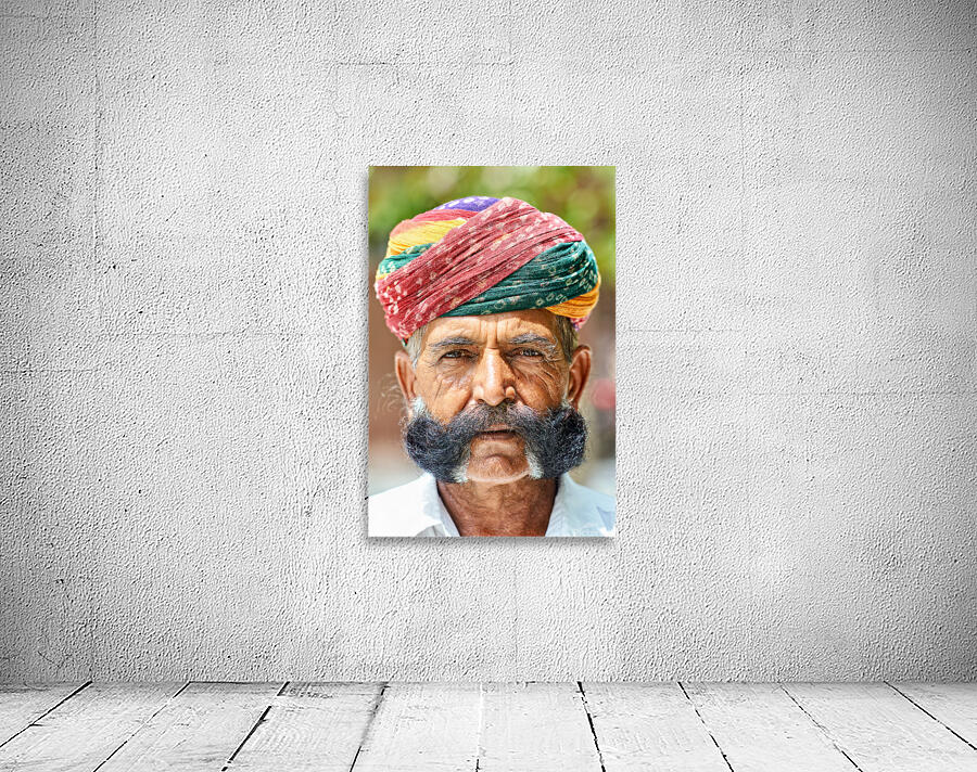Senior man in colorful turban in Deshnok Rajasthan India Wall Preview
