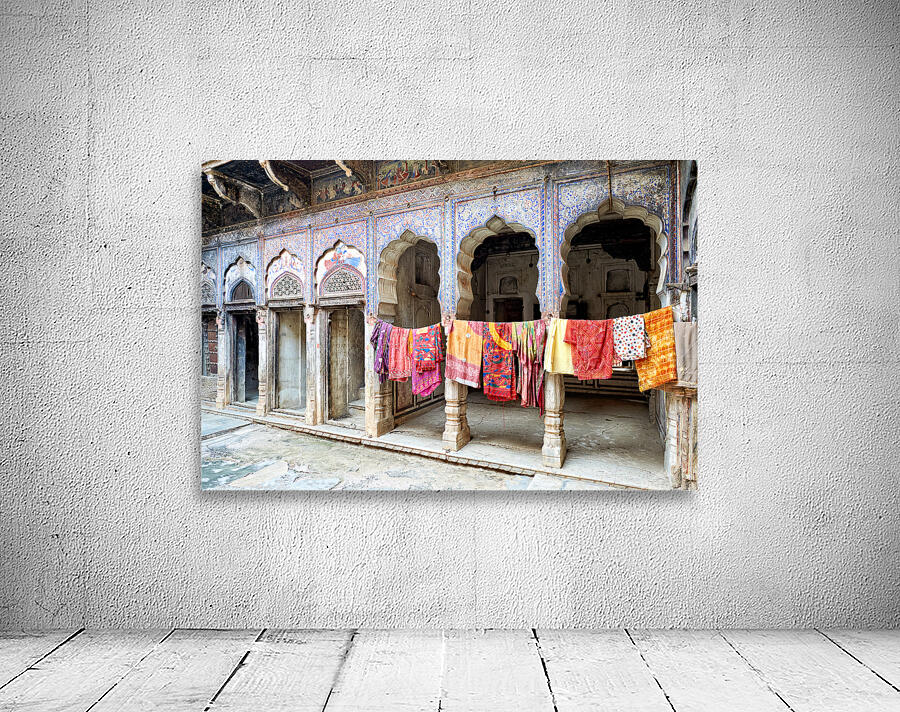 Decorated painted houses and colorful clothes in Mandawa Rajasth Wall Preview