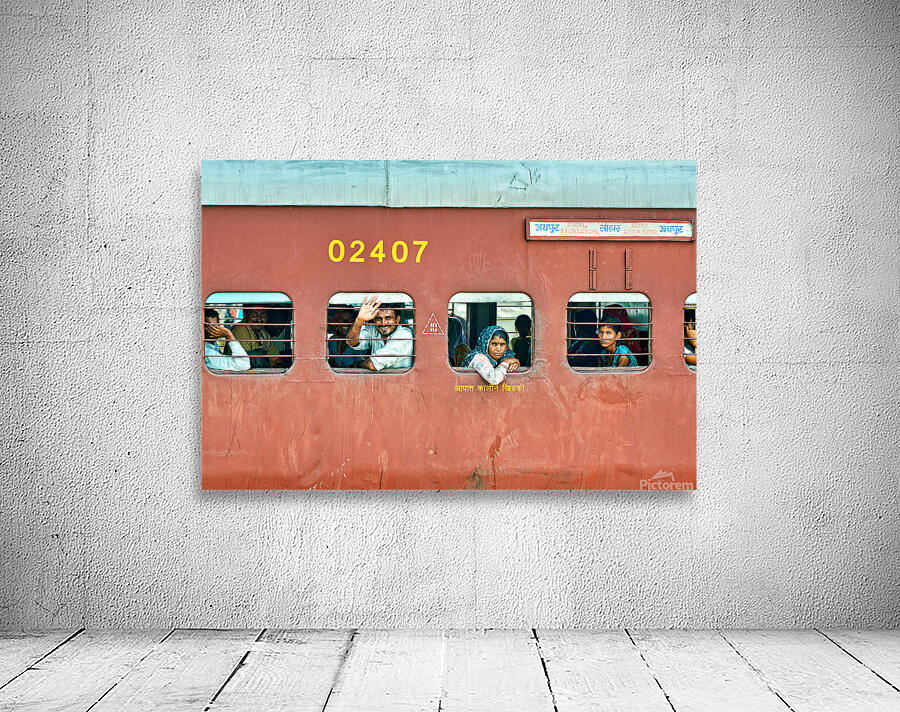 People travel on a train in Rajasthan India during the day Wall Preview