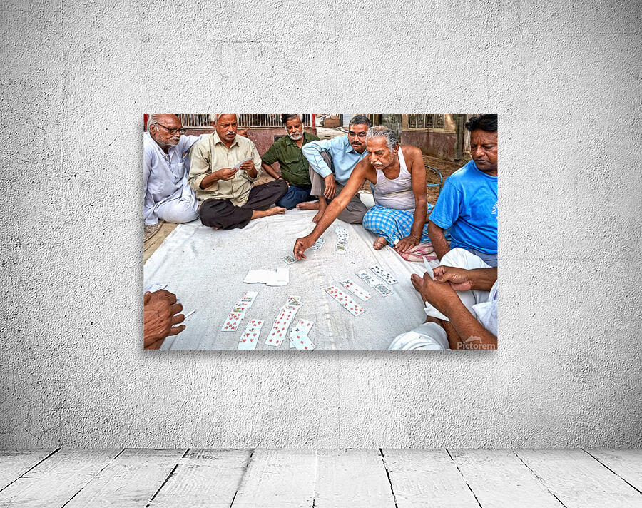 Men playing cards on the street in Bikaner Rajasthan during the Wall Preview
