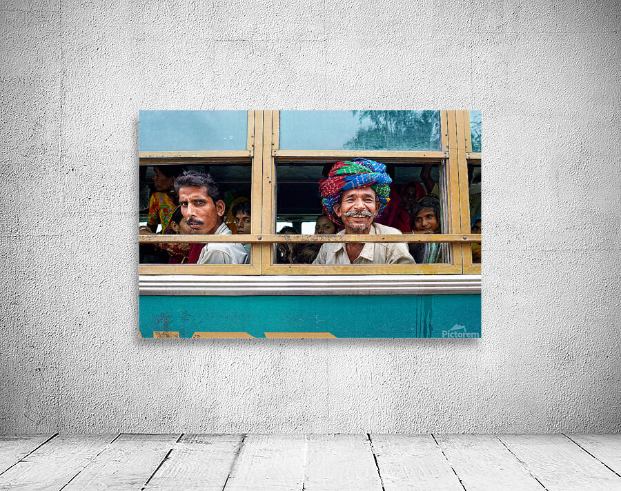 Passengers travel on bus in Udaipur Rajasthan India Wall Preview