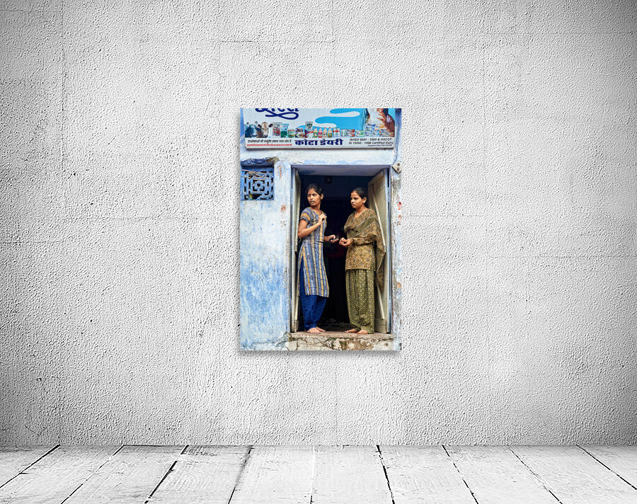 Women stand at their house door in Bundi Rajasthan Wall Preview