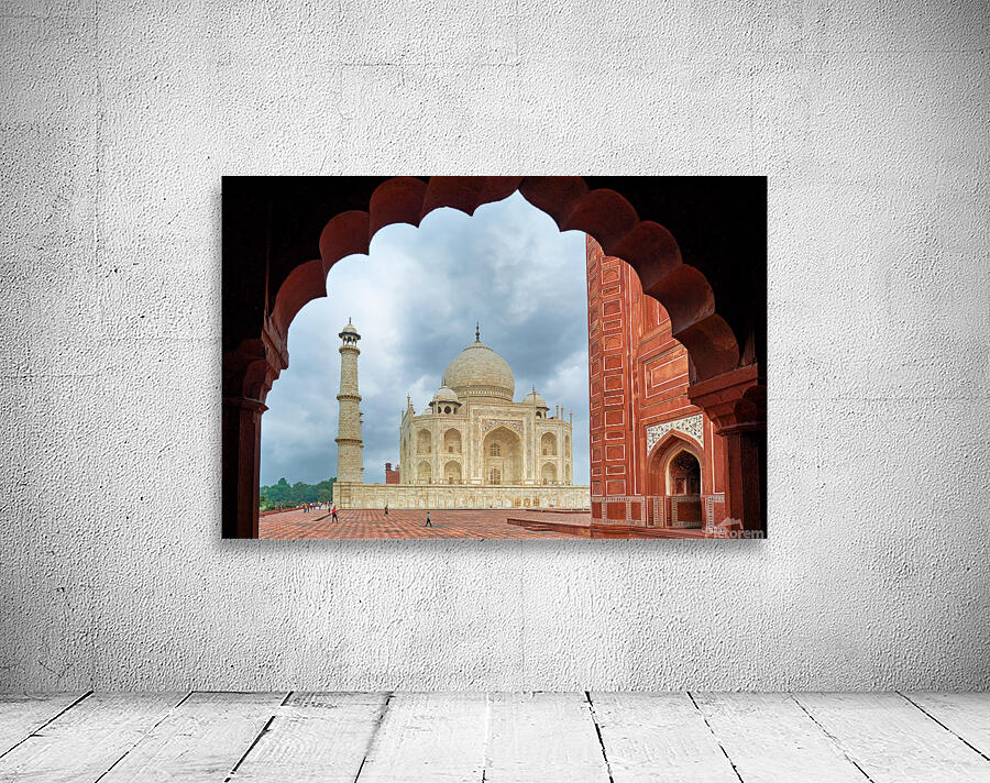 View of the Taj Mahal from an archway in Agra India Wall Preview
