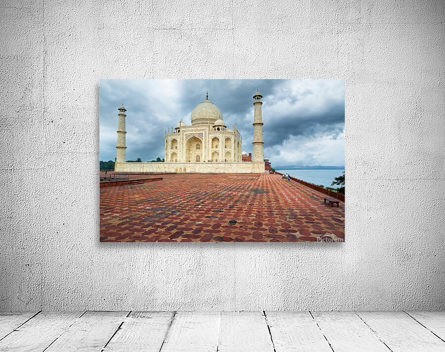 Taj Mahal in Agra during cloudy weather with empty courtyard Wall Preview