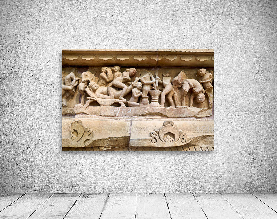 Hindu temples of Khajuraho show carvings of daily life and ritua Wall Preview