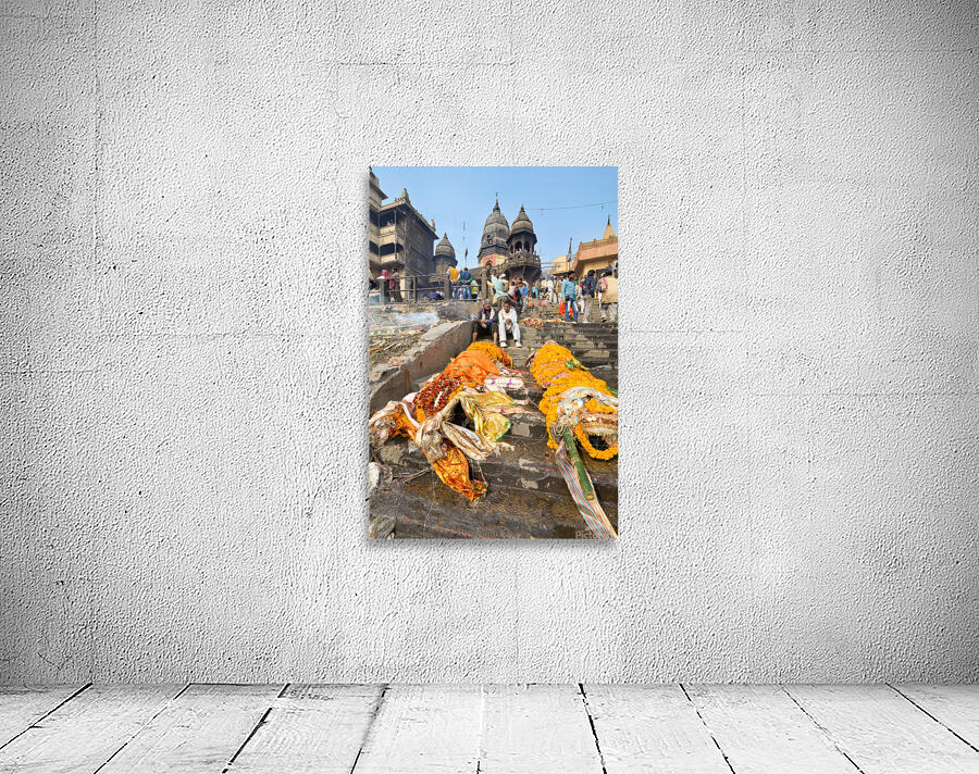 Cremation rites along the river Ganges in Varanasi India Wall Preview