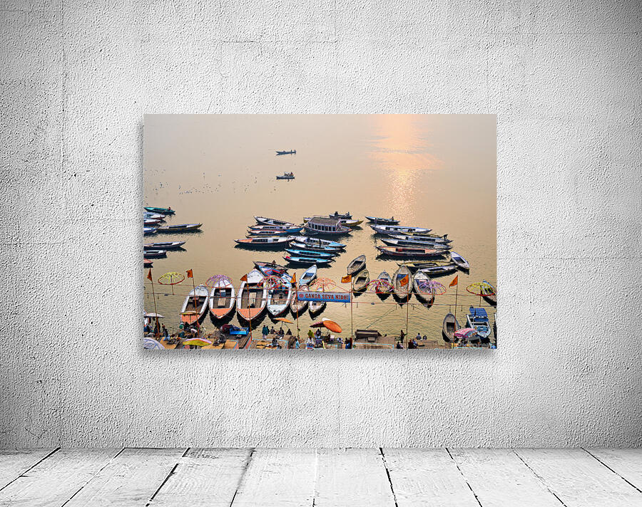 Sunrise at Ganges River in Varanasi with boats and activities Wall Preview