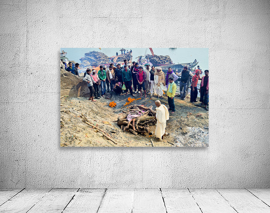 Cremation rites by the Ganges River in Varanasi India Wall Preview