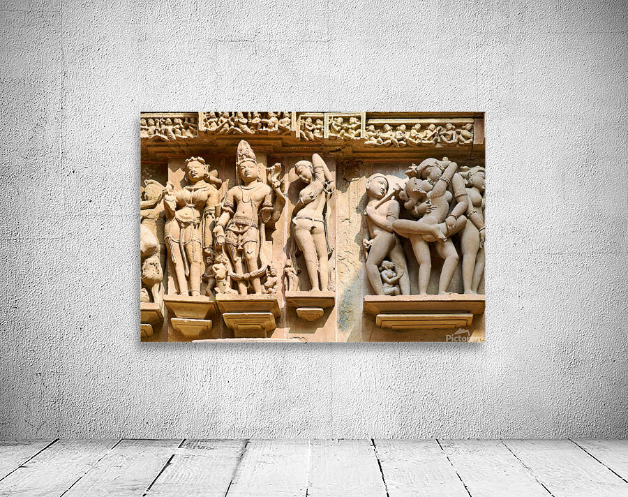 Hindu temples in Khajuraho display intricate carvings of life Wall Preview