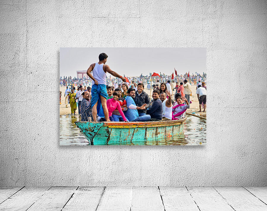People sit on a boat on the Ganges River Wall Preview