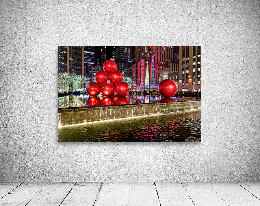 Manhattan showcases big red ornaments at Christmas time Wall Preview