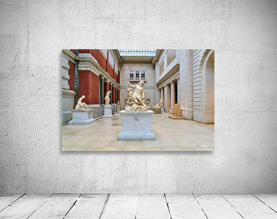 The sculpture of Andromeda and the sea monster stands in the Met Wall Preview