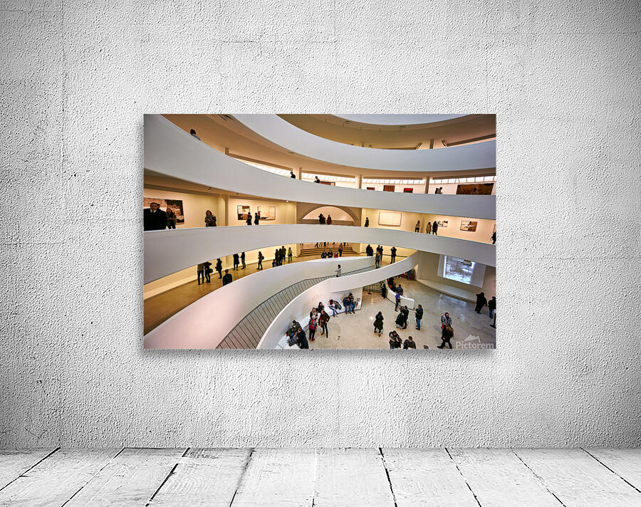 People walk through the spiraled structure of Solomon R Wall Preview