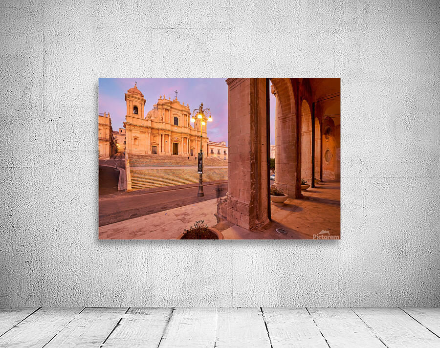 Noto Cathedral in Sicily glows at dusk with streetlights Wall Preview