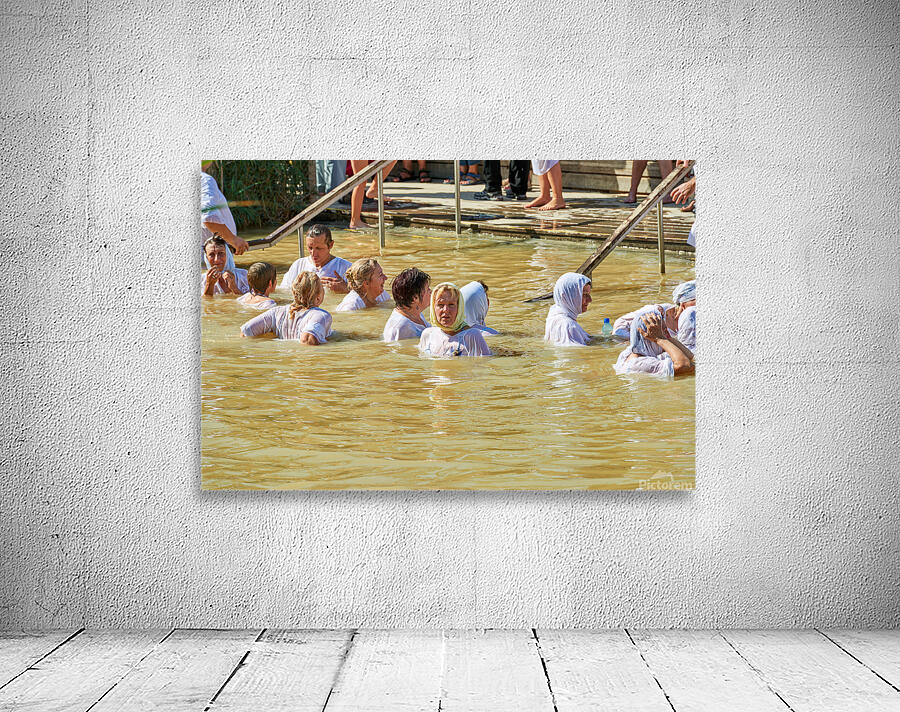 Visitors participate in baptism ceremony at Jordan River site Wall Preview