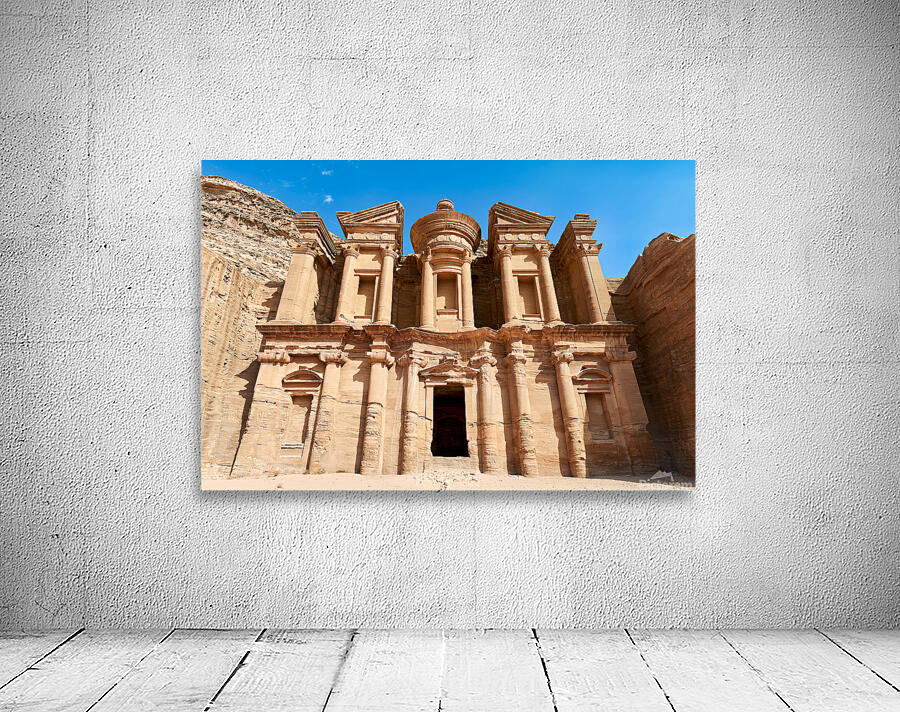 Visit to the Monastery at Petra in Jordan under clear blue sky Wall Preview