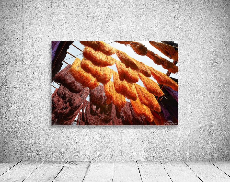 Colorful threads hanging in the dyers souk of Marrakesh Morocco Wall Preview