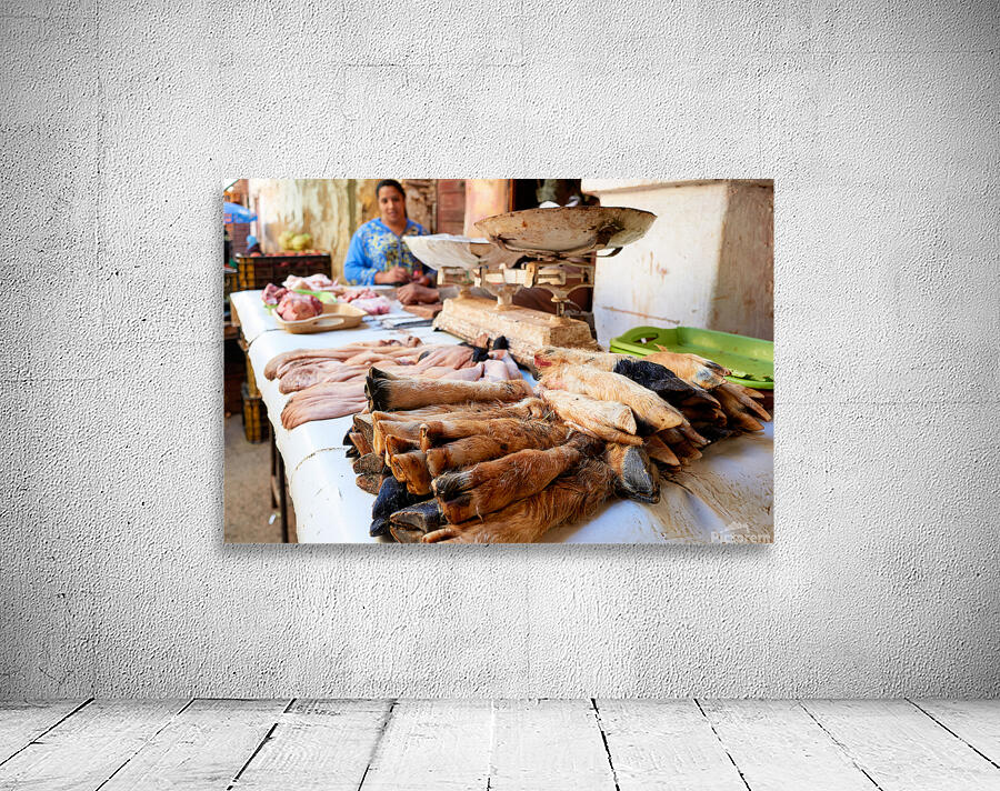 Butcher working in Meknes souk with various cuts of meat Wall Preview