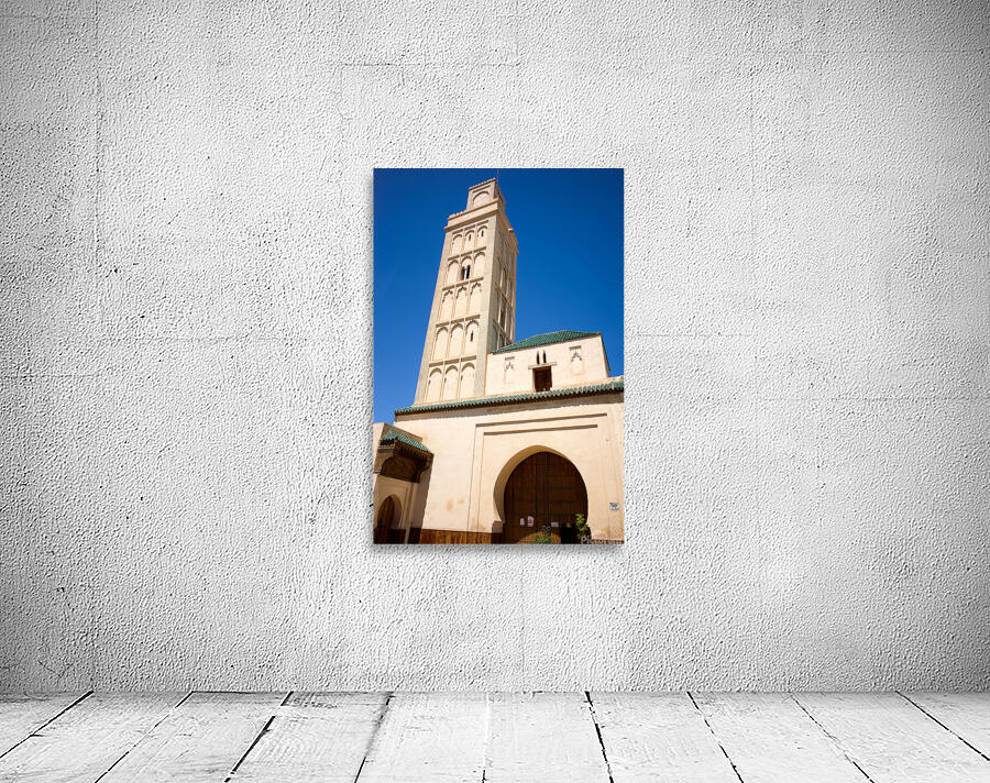 Visit Meknes mosque in Morocco with a tall tower and clear sky Wall Preview