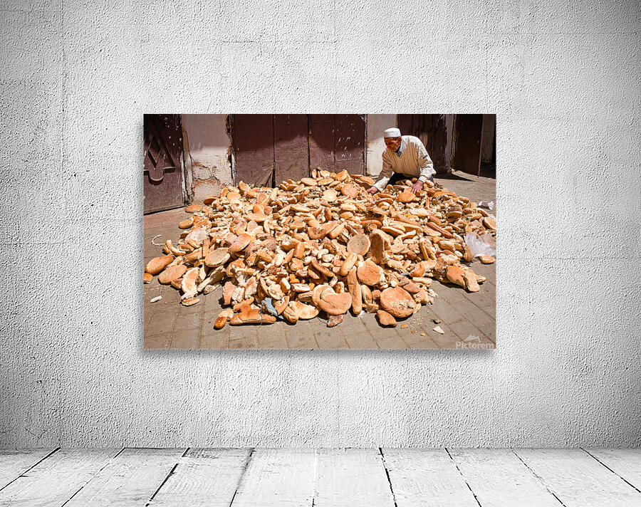 Collecting bread in Meknes Morocco during the day Wall Preview