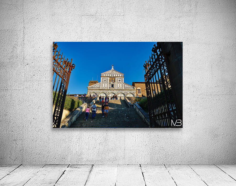 Visitors walk up the stairs to Basilica di San Miniato in Floren Wall Preview
