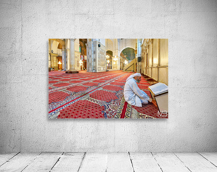 Visitor reading Quran in Umayyad Mosque in Damascus Wall Preview
