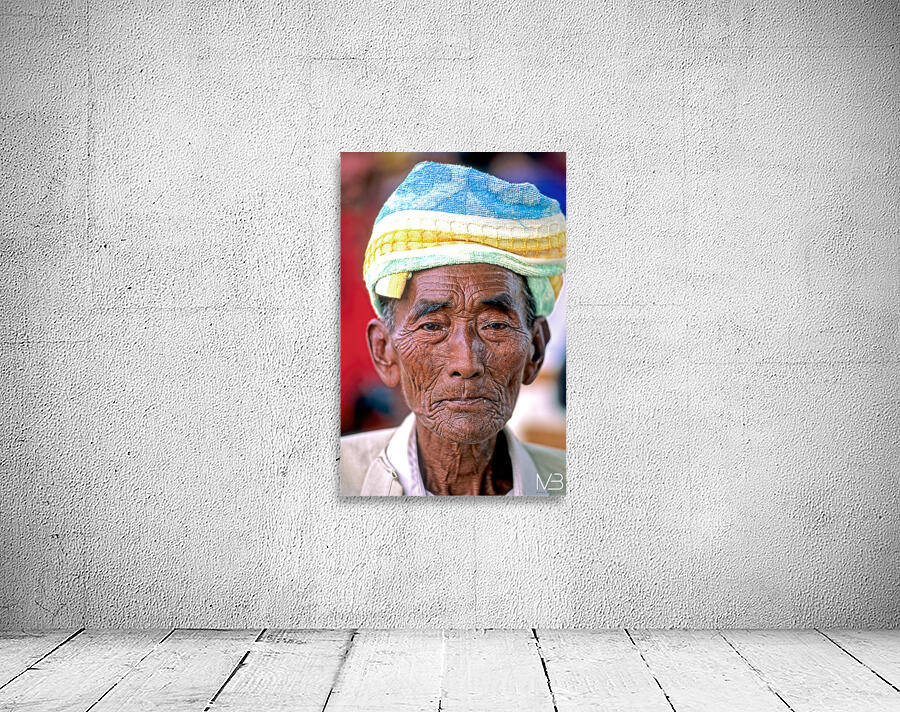 Portrait of an old man in Myanmar with a traditional head wrap Wall Preview