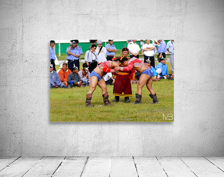 Wrestling matches take place during Naadam festival in Ulaanbaat Wall Preview