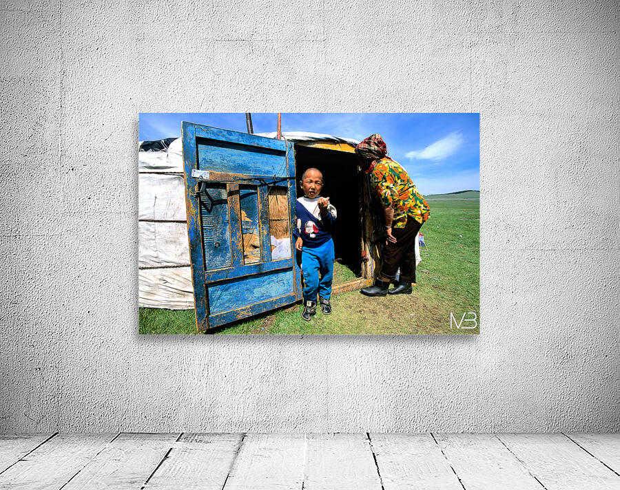 Ger tent in Mongolia with child and elder outside Wall Preview