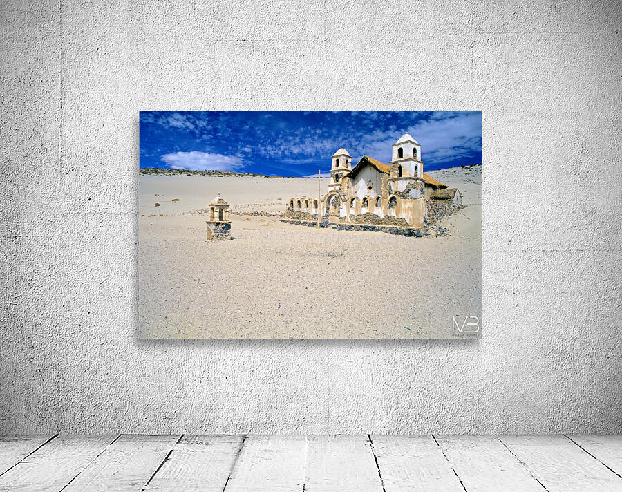 Old church ruins in a desolate sandy landscape. Wall Preview