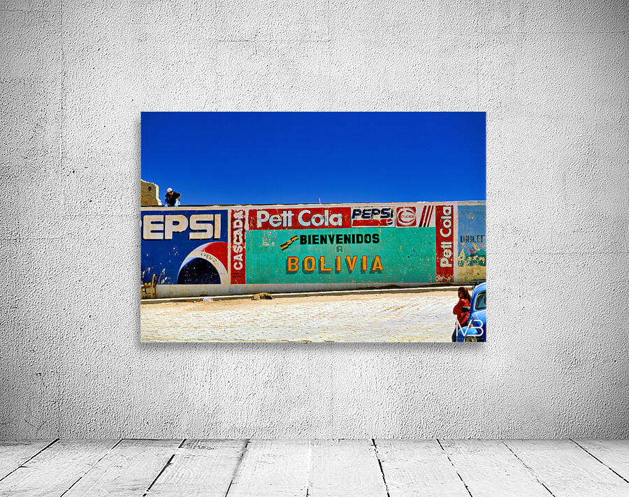 Welcome to Bolivia sign on a wall with old ads. Wall Preview