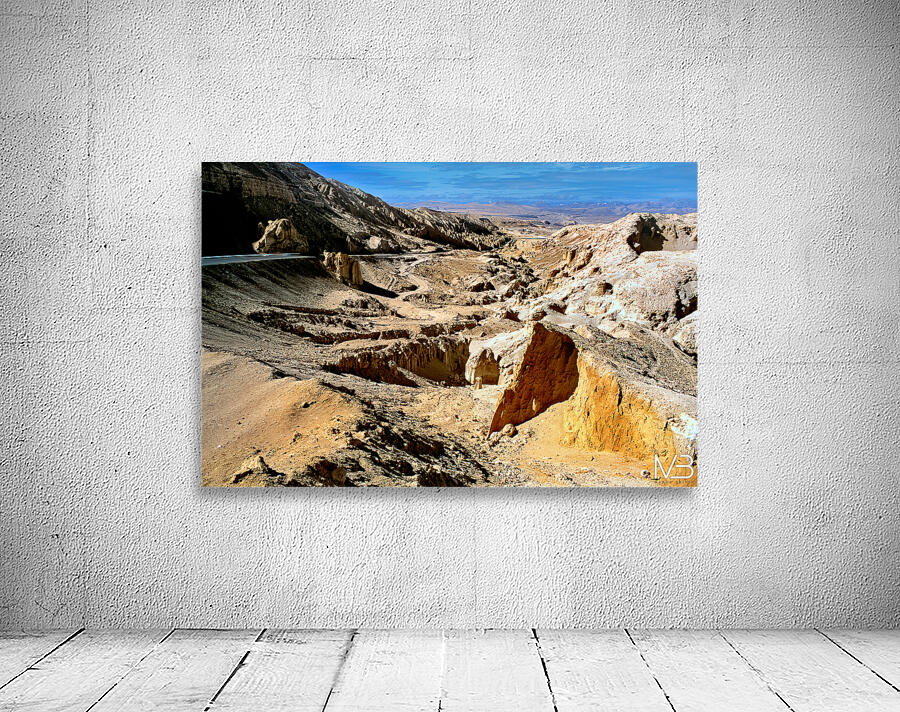 Dramatic arid mountain landscape with a winding road. Wall Preview
