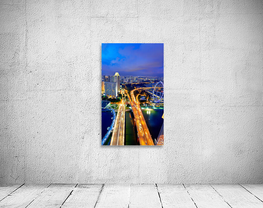 City lights shine in Marina Bay as sunset brings night activity Wall Preview