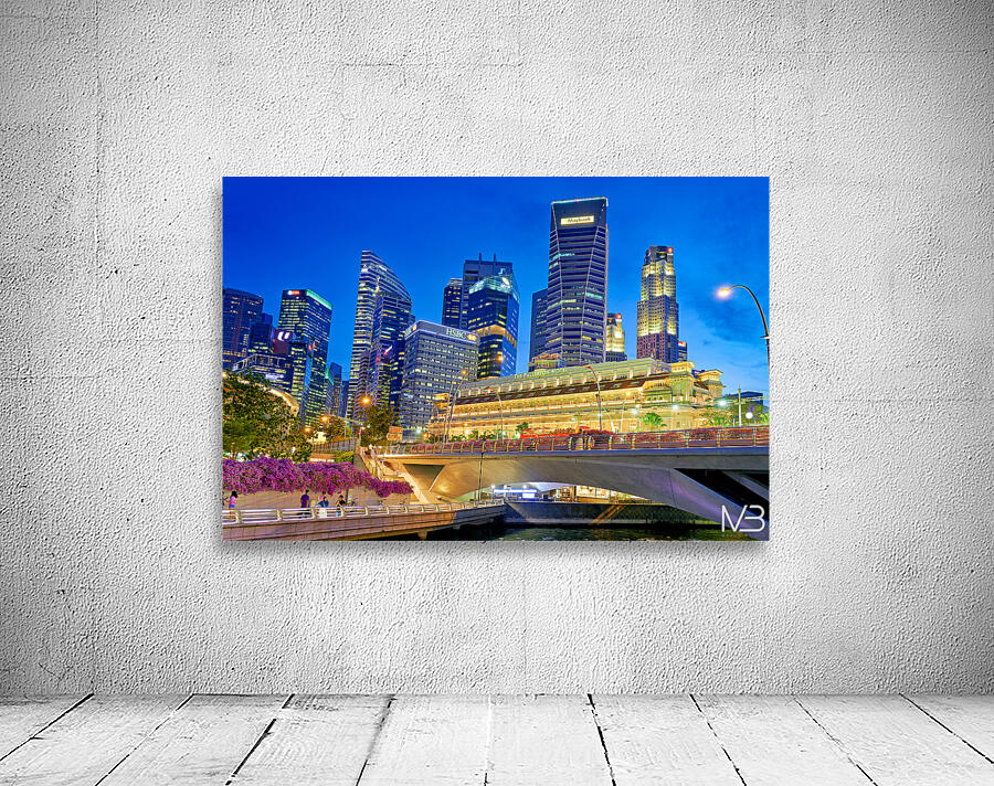 People walk by the waterfront in Marina Bay during sunset in Sin Wall Preview