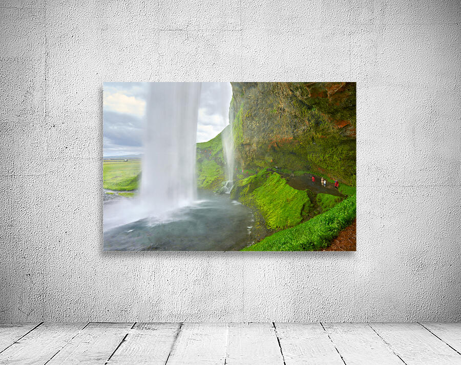 Seljalandsfoss waterfall view from behind in Iceland Wall Preview
