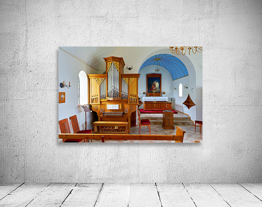 Wooden church interior with organ in Vik i Myrdal Iceland Wall Preview