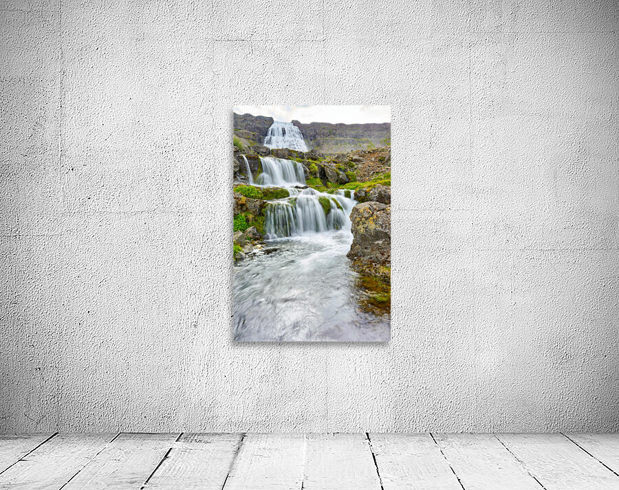 Gongumannafoss waterfall in Iceland with flowing water Wall Preview