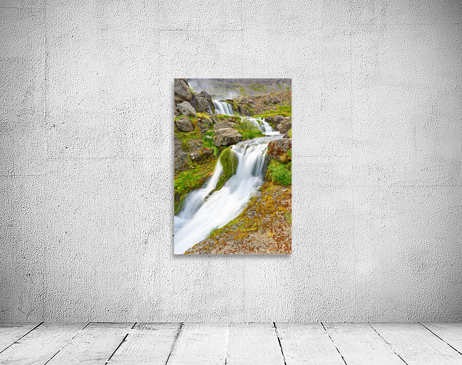 Gongumannafoss waterfall flows in Iceland during daylight hours Wall Preview