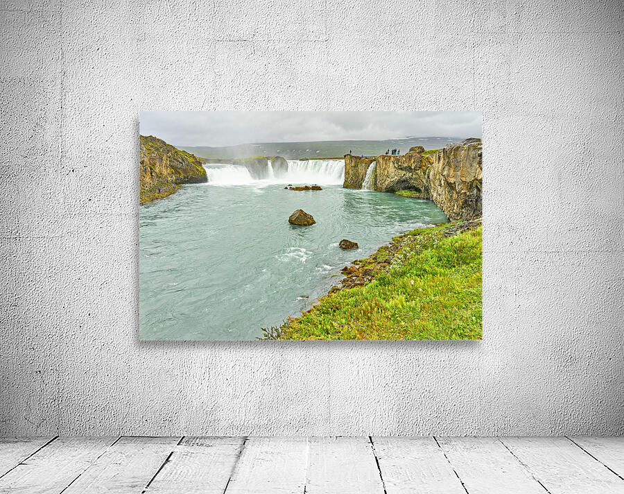 Exploring Godafoss waterfall in Iceland on a cloudy day Wall Preview