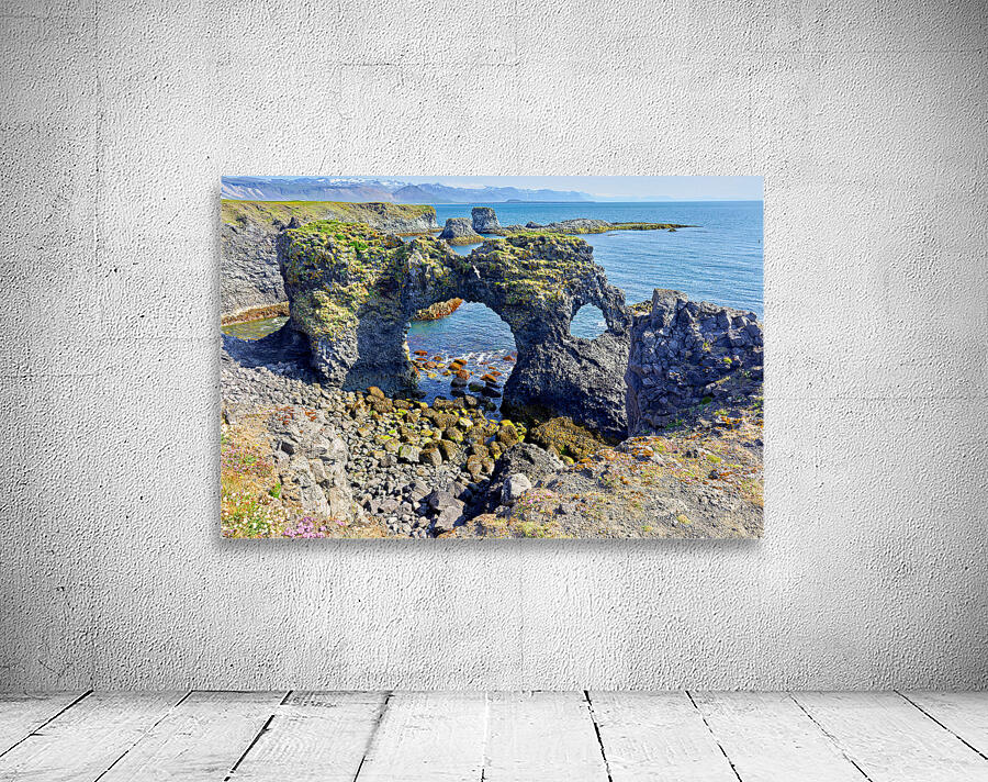 Exploring arnarstapi cliff in Iceland by the ocean Wall Preview