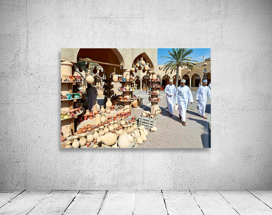 Visitors explore the market at Nizwa Oman during the day Wall Preview