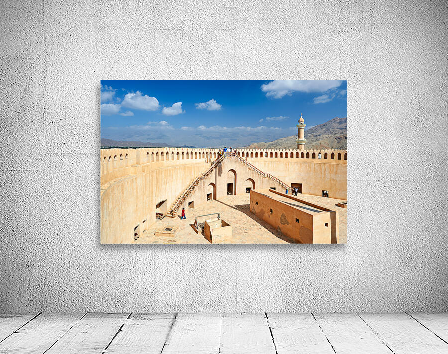 Visit to Nizwa Fort in Oman with visitors and open sky Wall Preview