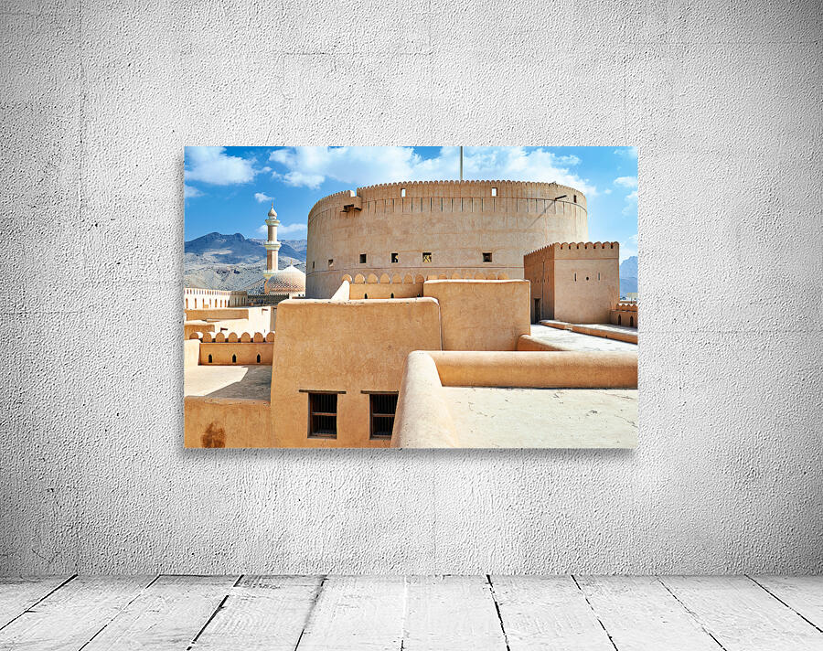 Visitors explore Nizwa Fort a historic site in Oman Wall Preview