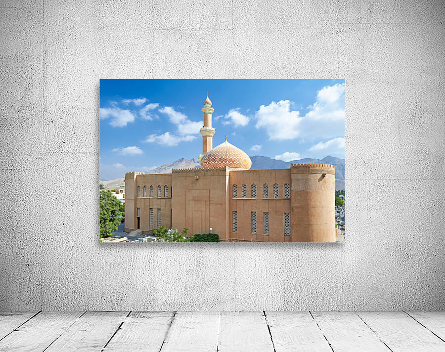 Nizwa Fort view with mountains and clouds in Oman Wall Preview