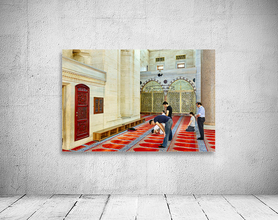People pray inside Suleymaniye Mosque in Istanbul Turkey Wall Preview