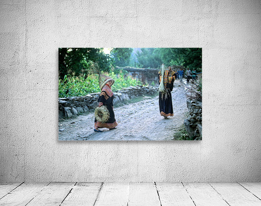 Women working in Bumburet Valley Kalash village Wall Preview
